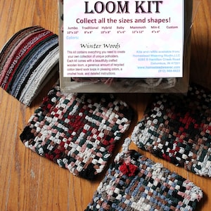 May include: A loom kit for making potholders. The kit includes a wooden loom, recycled cotton blend sock loops in various colors, a crochet hook, and instructions. The kit is called "Winter Woods".