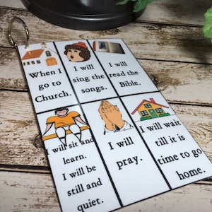 May include: A rectangular white card with a metal ring, featuring six illustrated panels with text: When I go to Church, I will sing the songs, I will read the Bible, I will sit and learn, I will be still and quiet, I will pray, and I will wait till it is time to go home.