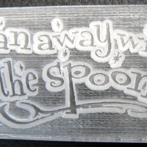 May include: White text on a clear background reads "ranaway with the spoon".