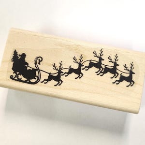 Papai Noel com carimbo de borracha de trenó P23