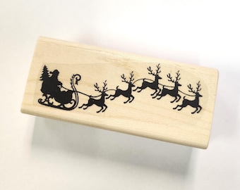 Santa Claus with sled rubber stamp P23