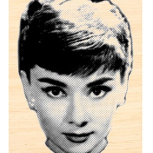 May include: Black and white photo of a woman with short hair. The photo is in a vintage style with a halftone effect.
