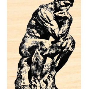 May include: A black and white silhouette of a sculpture of a man sitting with his chin resting on his hand, in a contemplative pose.