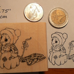 Christmas girl mouse with sled rubber stamp P60