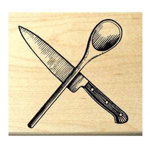 May include: A black and white illustration of a wooden spoon and a kitchen knife crossing each other.