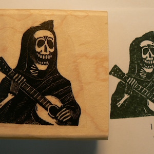 P46 Magere Hein- schedel- las posadas- gitaar spelen skelet, rubberen stempel