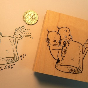 Kewpies regando el sello de goma del jardín P31