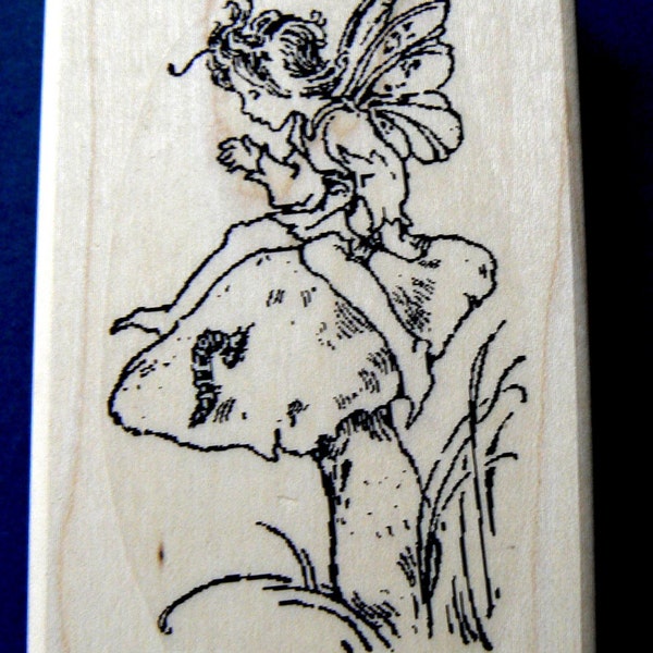 Fairy on mushroom rubber stamp  P19