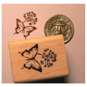P24 Butterfly on flower rubber stamp miniature
