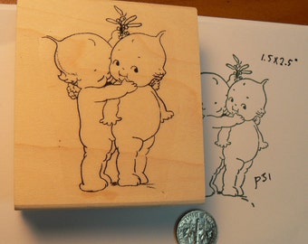 Kewpie Kiss under the mistletoe rubber stamp  P31