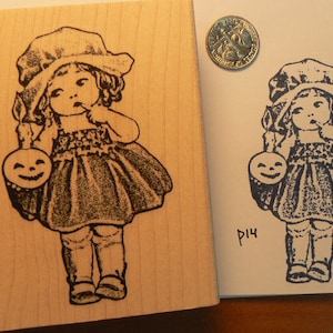Sello de goma estilo vintage con niña calabaza P14