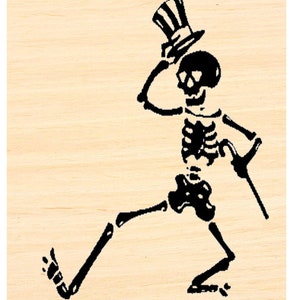May include: A black and white skeleton wearing a top hat and holding a cane. The skeleton is in a dancing pose with one leg raised.