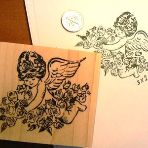 Kleiner Engel mit Blumen Amor Engelchen Stempel WM P14
