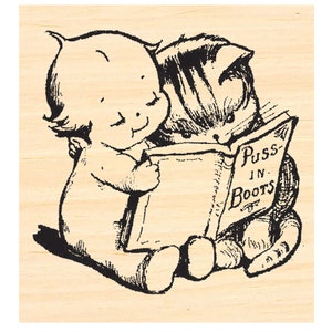 P137 Kewpie met kitten die een boek leest - rubberen stempel