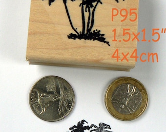 May include: A wooden stamp with a black silhouette of three palm trees. The stamp measures 1.5 x 1.5 inches and 4 x 4 cm. The stamp is labeled "P95".