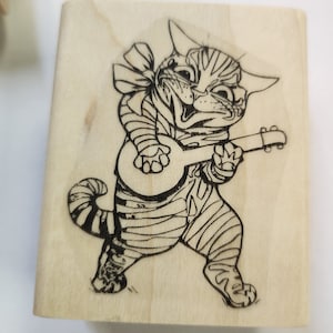 P41 Cat playing banjo rubber stamp