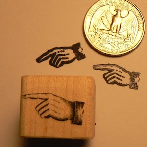 P24 Pointing finger rubber stamp miniature