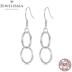 May include: A pair of silver dangle earrings with two interlocking circles. The earrings are made of 925 sterling silver.
