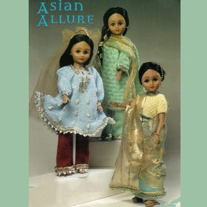 May include: Three dolls wearing traditional Asian clothing. The doll on the left is wearing a light blue dress with a white trim, a red skirt, and a white veil. The doll in the middle is wearing a light green dress with a white trim and a white scarf. The doll on the right is wearing a gold and blue dress with a yellow top and a white scarf. The dolls are all smiling and looking at the camera. The text "Asian Allure" is printed at the top of the image.