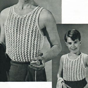 May include: A white, open-weave crochet tank top. The sleeveless top has a scoop neck and a textured, grid-like pattern. The image shows the tank top on two people, one an adult and the other a child. The tank top is a vintage style.