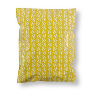 May include: A yellow poly mailer with a white geometric pattern. The mailer is made of a durable, waterproof material and is ideal for shipping small items.