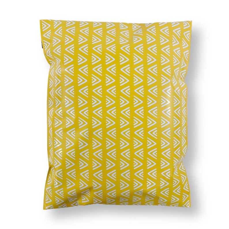 May include: A yellow poly mailer with a white geometric pattern. The mailer is made of a durable, waterproof material and is ideal for shipping small items.
