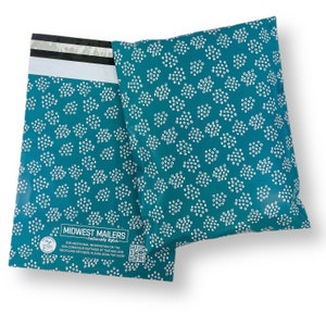 May include: Two teal blue poly mailers with a white polka dot pattern. The mailers have a white label with the text "MIDWEST MAILERS - Sustainably Stylish" and a QR code.