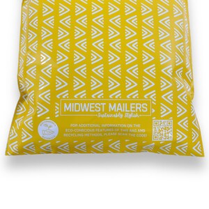 May include: Yellow mailing envelope with a white chevron pattern and the text "MIDWEST MAILERS - Sustainably Stylish -" and a QR code. The envelope has a green eco-conscious materials logo.