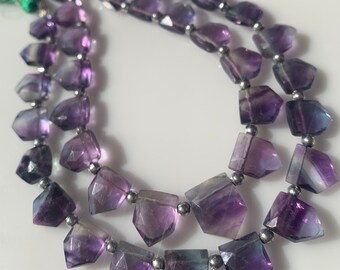 Full strand of faceted fluorite flags