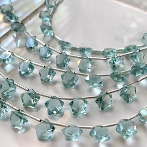Gorgeous aqua quartz faceted stars