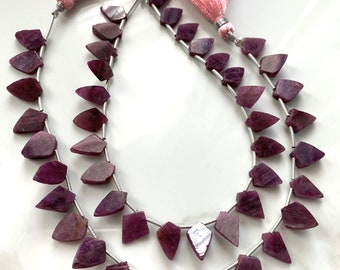 1/2 strand ruby bicone shaped slices