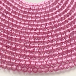 Pink topaz round beads small
