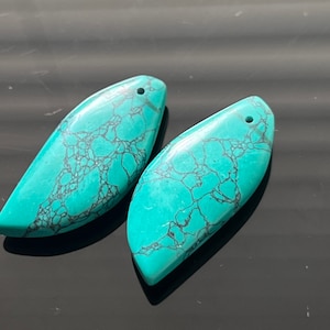 Matching pair turquoise smooth polished long pears