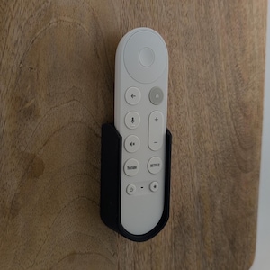 Wallmote for Google TV Streamer Voice Remote – Sleek and Secure Wall Mounted Holder.