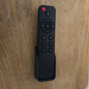 Wallmote for WiiM Voice Remote for WiiM Mini and Pro audio streamer – Sleek and Secure Wall Mounted Remote Holder.