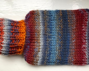 Mini hot water bottle and hand knitted lightly felted cozy, wool rich cover, mini 500ml, blended colours, reds, blues, glowing orange