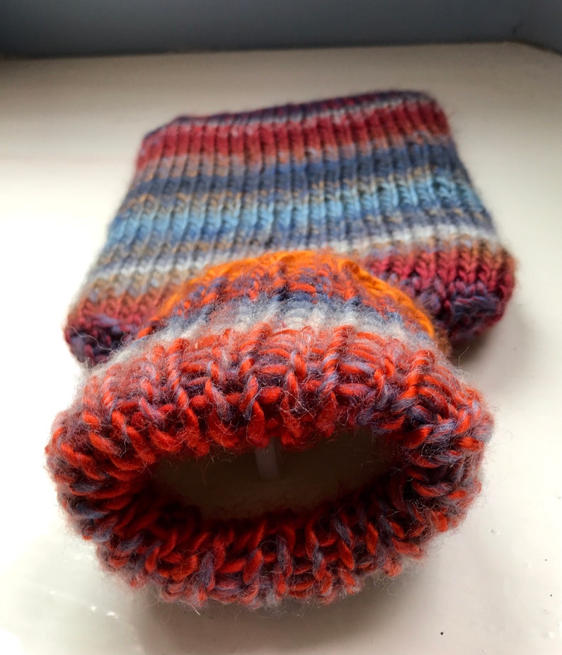 Mini hot water bottle and hand knitted lightly felted cozy, wool rich cover, mini 500ml, blended colours, reds, blues, glowing orange image 4