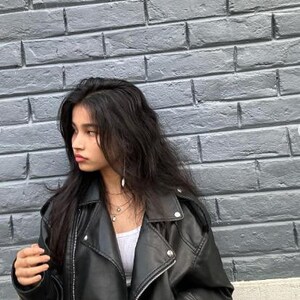 Oversized black faux leather biker jacket with asymmetric zip closure and bold lapel neckline, styled in modern Y2K streetwear fashion. This edgy moto jacket features a relaxed silhouette inspired by vintage bikerjacket trends and casual urban style. Perfect for fall winter outfits, minimalist fashion, and everyday casual wear, this trendy women leather jacket pairs effortlessly with denim, boots, and layered street style looks. A timeless faux leather outerwear piece for Etsy fashion lovers.