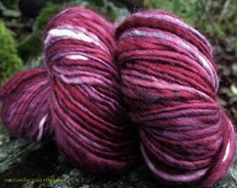 Handspun yarn, handpainted wool, glass of merlot