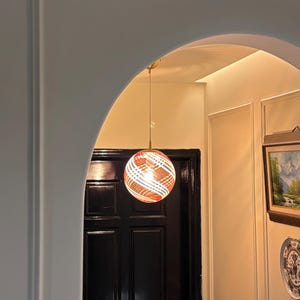 Hand Blown Glass Pendant Light: Red & White Swirls, Brass Fixture