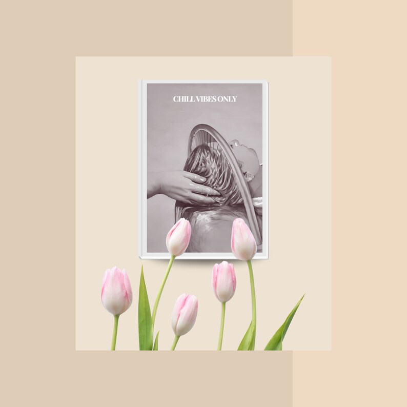 May include: A framed print with the text "Chill Vibes Only" and a black and white photo of a person getting their hair washed in a salon chair.