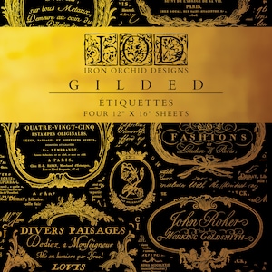 May include: Black and gold vintage-style decorative paper sheets. The sheets feature ornate frames, text, and illustrations. The text includes the words "Iron Orchid Designs," "Gilded," and "Étiquettes." Each sheet measures 12 x 16 inches.