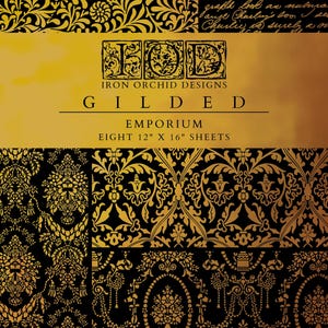 May include: A package of decorative paper sheets with ornate gold floral patterns on a black background. The package is labeled "GILDED EMPORIUM" by Iron Orchid Designs. Each sheet measures 12" x 16".