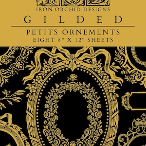 May include: Eight 8-inch by 12-inch sheets of gold-colored decorative paper with ornate designs. The paper is from Iron Orchid Designs and is called "Gilded Petits Ornements".
