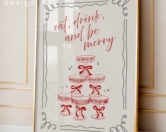 Könnte beinhalten: Gerahmter Druck mit den Worten „eat, drink, and be merry“ in roter Schrift. Das Bild zeigt einen Stapel roter Kuchenständer mit Schleifen, vor einem neutralen Hintergrund und goldgerahmt.