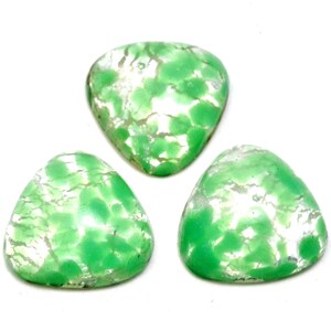 May include: Three green and white triangular cabochons with a marbled pattern.