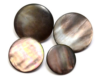 Set of four antique smoky mother of pearl metal shank buttons, smalls and mediums (P15)