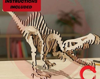 May include: A wooden dinosaur skeleton puzzle with the text "PDF-ASSEMBLY INSTRUCTIONS INCLUDED" on a red background. The dinosaur is light brown and appears to be made of laser-cut wood pieces. The product is from Dragon Laser Cut.
