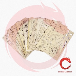 May include: A collection of laser-cut wooden puzzle pieces, featuring intricate designs of gears, circles, and geometric shapes. The pieces are arranged in a fan shape, with the "DRAGON LASER CUT" logo in the bottom right corner.