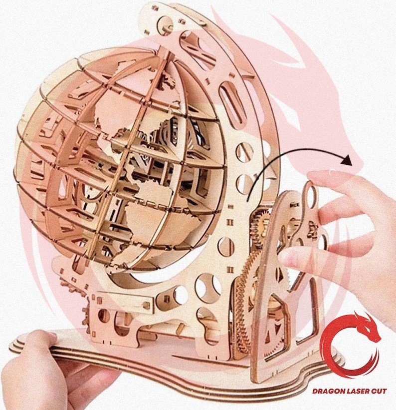 May include: A wooden globe puzzle with intricate laser-cut details. The globe features a skeletal design, showcasing the continents. The puzzle includes gears and a base, all crafted from light-colored wood. The design is complex and appears to be a DIY project.